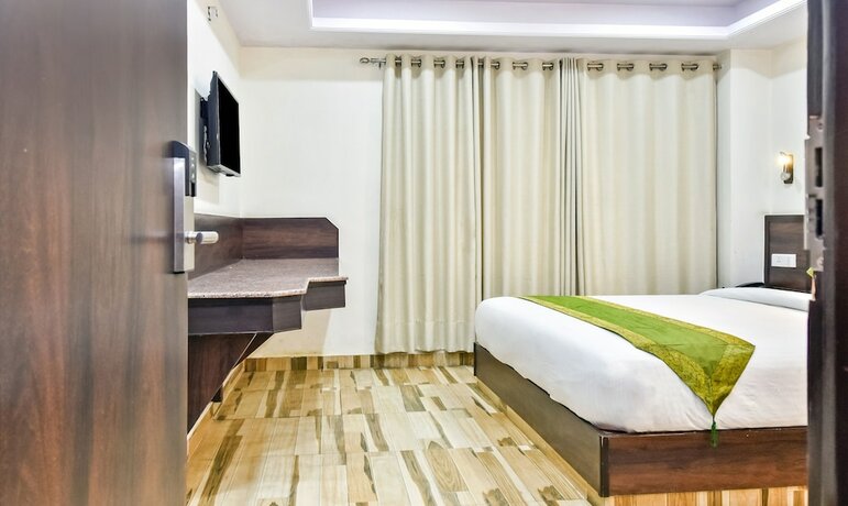 Imagen de la habitación del Hotel Treebo Maharaja. Foto 17