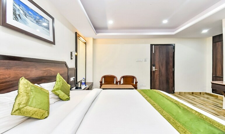 Imagen de la habitación del Hotel Treebo Maharaja. Foto 21