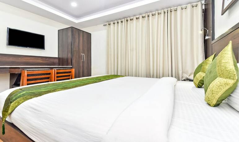 Imagen de la habitación del Hotel Treebo Maharaja. Foto 28