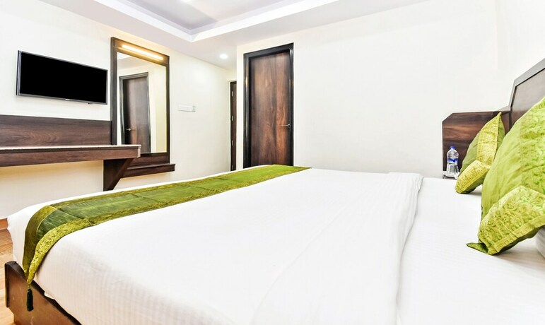 Imagen de la habitación del Hotel Treebo Maharaja. Foto 29