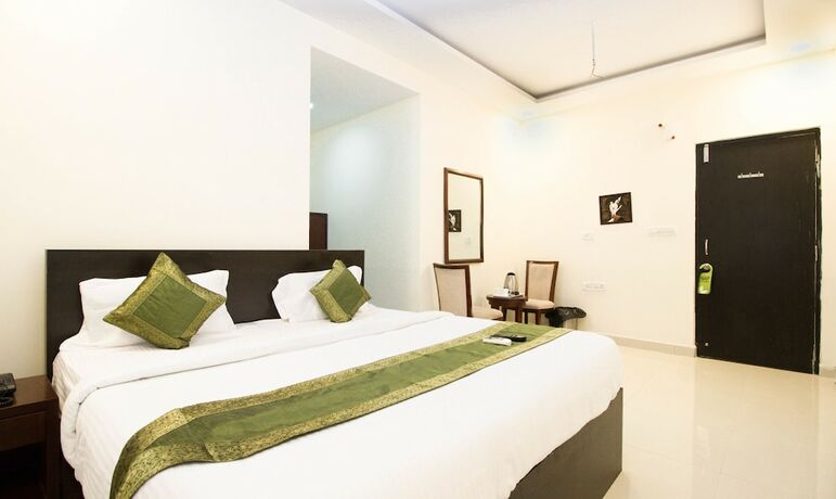 Imagen de la habitación del Hotel Treebo Midtown. Foto 18