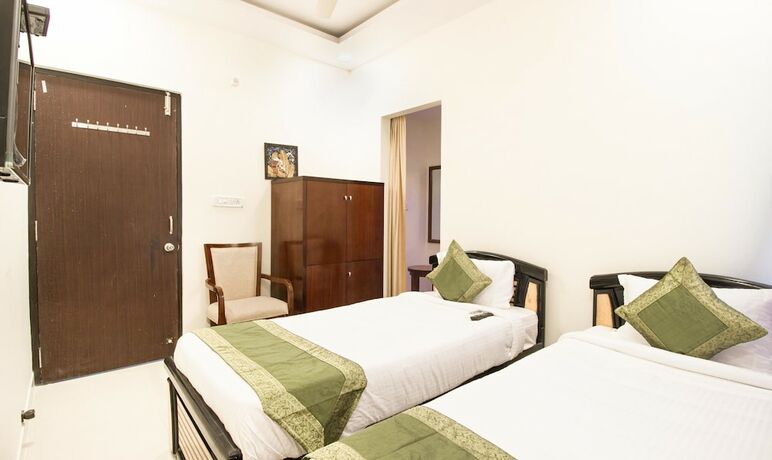 Imagen de la habitación del Hotel Treebo Midtown. Foto 20