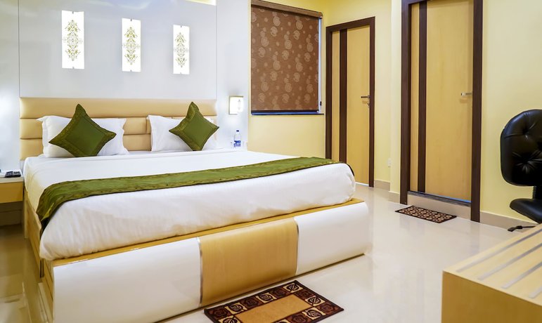 Imagen de la habitación del Hotel Treebo Oasis. Foto 9