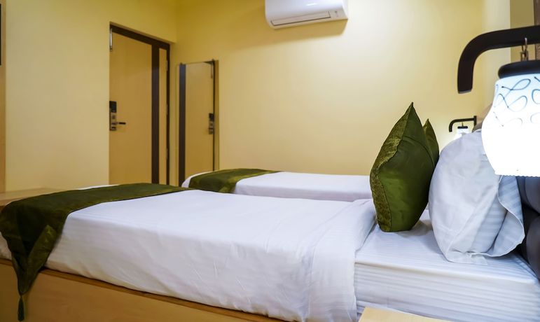 Imagen de la habitación del Hotel Treebo Oasis. Foto 14