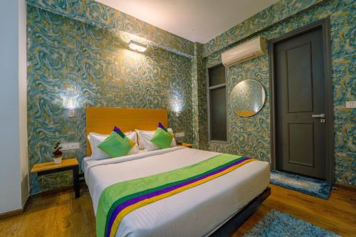 Imagen de la habitación del Hotel Treebo Premium Inn. Foto 19