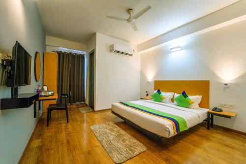 Imagen de la habitación del Hotel Treebo Premium Inn. Foto 20