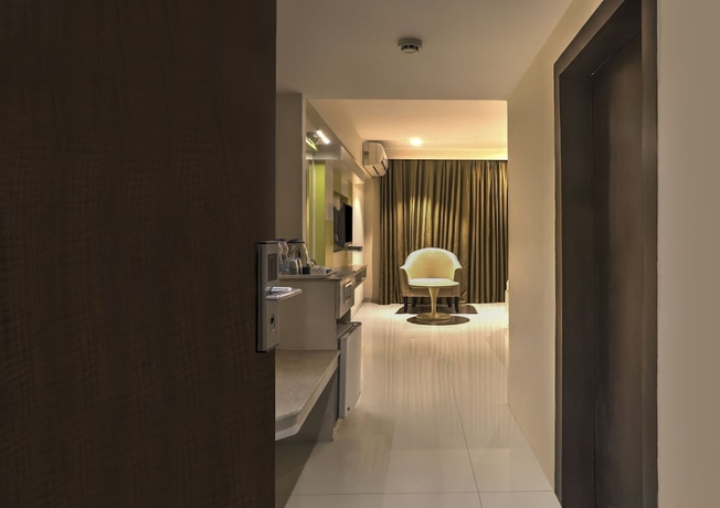 Imagen de la habitación del Hotel Treebo Premium Metropolis. Foto 3