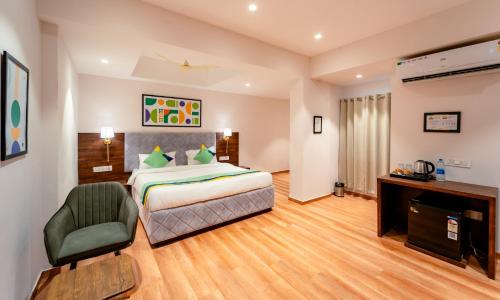 Imagen de la habitación del Hotel Treebo Premium Omni Residency. Foto 19