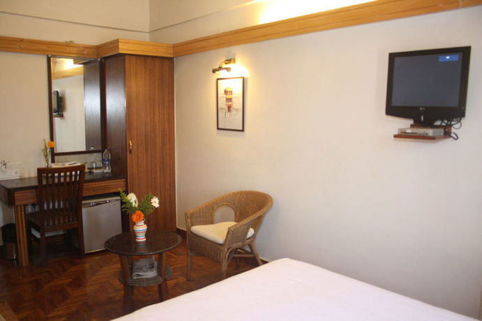 Imagen de la habitación del Hotel Treebo Sahara Shivaji Nagar. Foto 6