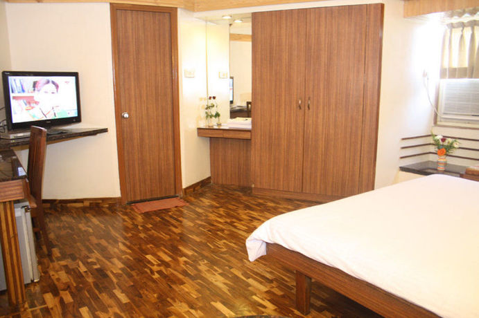 Imagen de la habitación del Hotel Treebo Sahara Shivaji Nagar. Foto 8