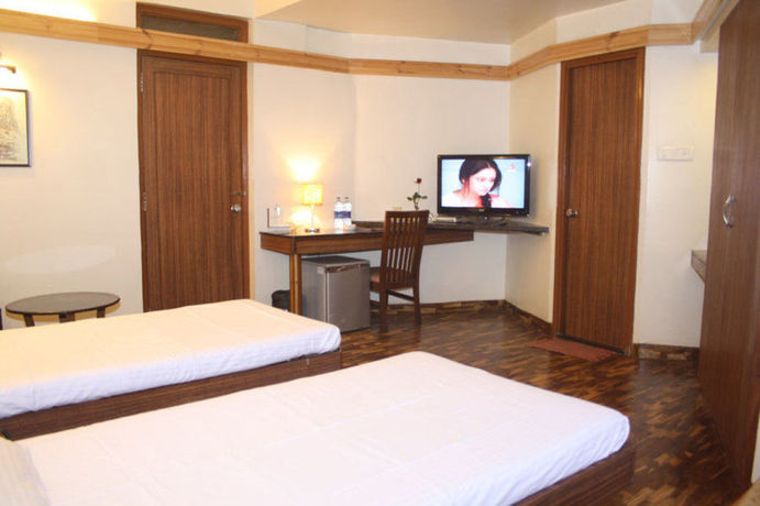 Imagen de los interiores del Hotel Treebo Sahara Shivaji Nagar. Foto 16