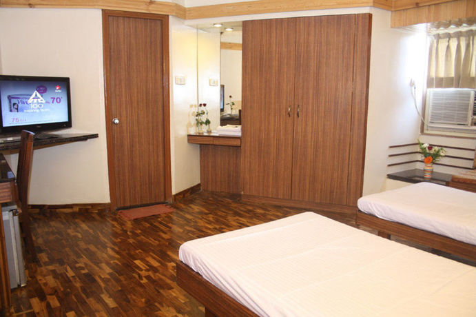 Imagen de la habitación del Hotel Treebo Sahara Shivaji Nagar. Foto 14