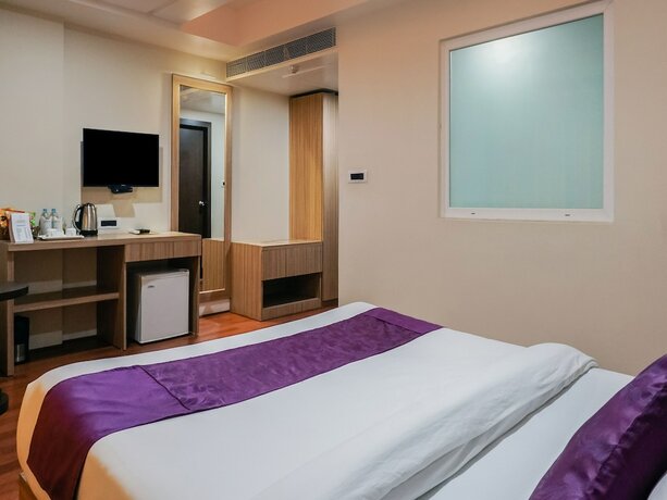 Imagen de la habitación del Hotel Treebo Select The Kalyaniz. Foto 6