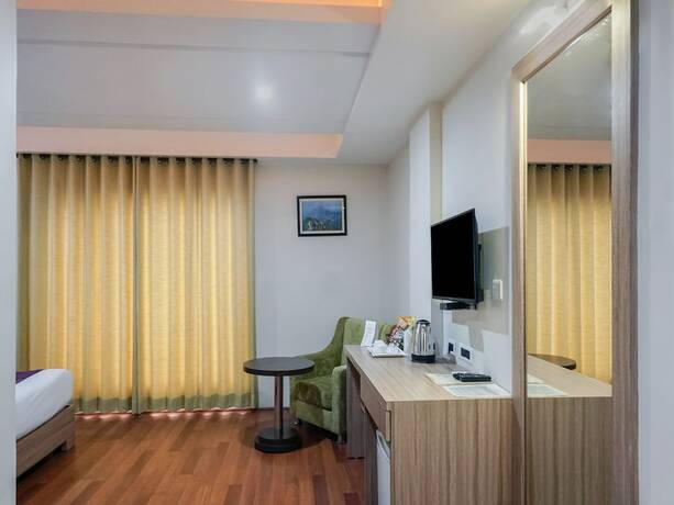 Imagen de la habitación del Hotel Treebo Select The Kalyaniz. Foto 8