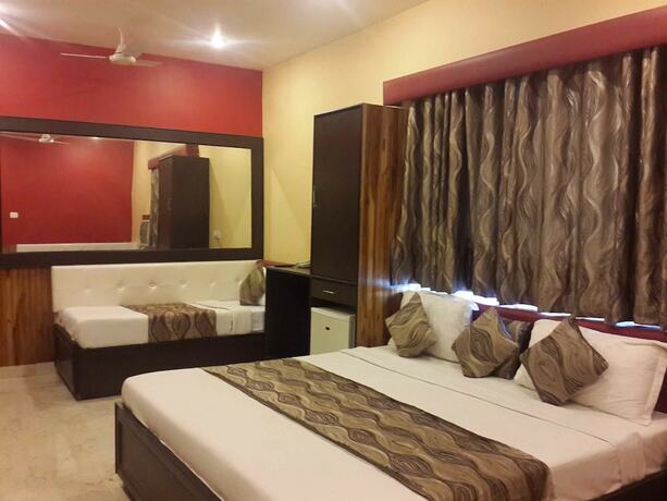 Imagen de la habitación del Hotel Treebo Select Varuna. Foto 4