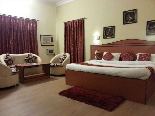 Imagen de la habitación del Hotel Treebo Select Varuna. Foto 5
