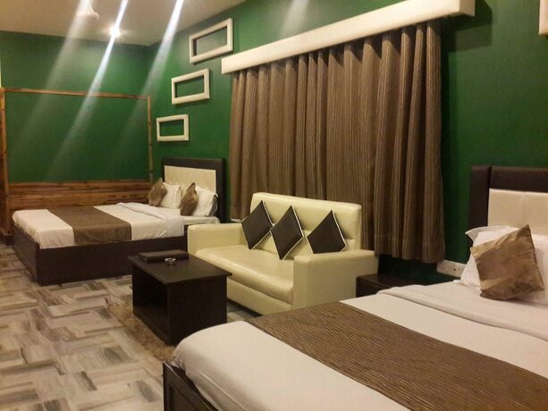 Imagen de la habitación del Hotel Treebo Select Varuna. Foto 6