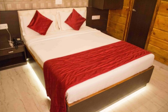 Imagen de la habitación del Hotel Treebo Select Varuna. Foto 11