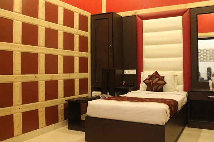 Imagen de la habitación del Hotel Treebo Select Varuna. Foto 12