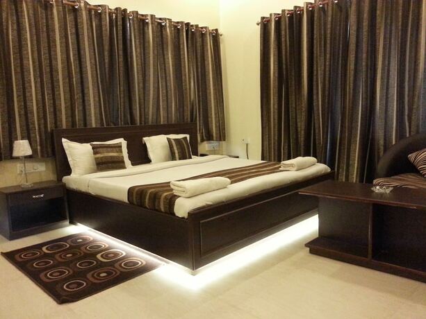 Imagen de la habitación del Hotel Treebo Select Varuna. Foto 13
