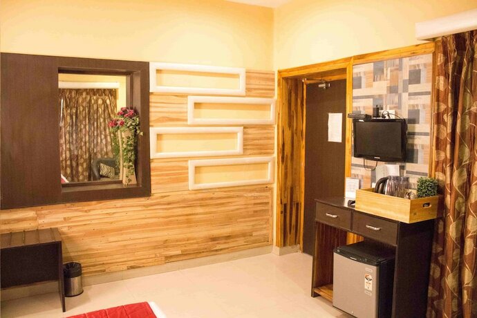 Imagen de la habitación del Hotel Treebo Select Varuna. Foto 15
