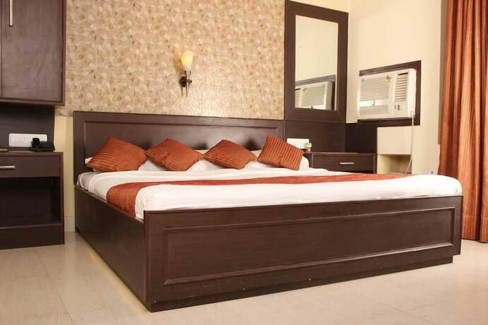 Imagen de la habitación del Hotel Treebo Select Varuna. Foto 19