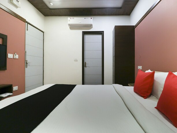 Imagen de la habitación del Hotel Treebo Seven. Foto 8