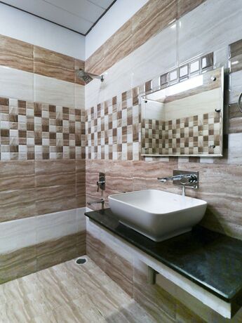 Imagen de la habitación del Hotel Treebo Seven. Foto 17