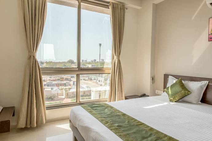 Imagen de la habitación del Hotel Treebo Shrimad Residency. Foto 3