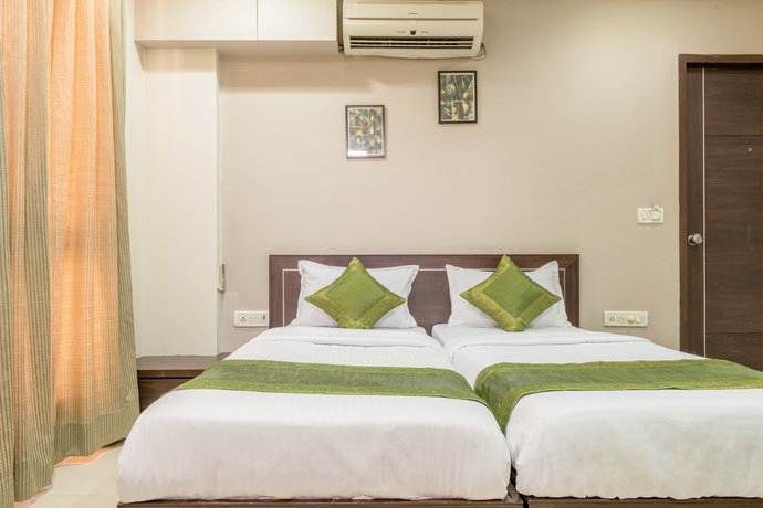 Imagen de la habitación del Hotel Treebo Shrimad Residency. Foto 5