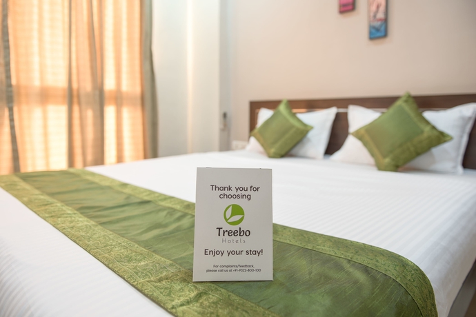 Imagen de la habitación del Hotel Treebo Shrimad Residency. Foto 8