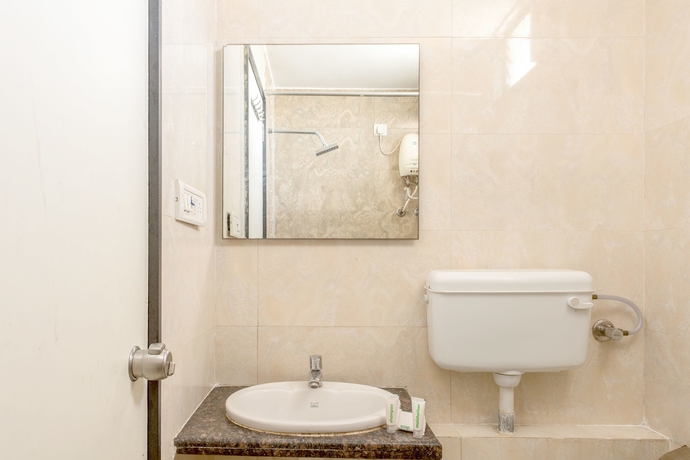 Imagen de la habitación del Hotel Treebo Shrimad Residency. Foto 11