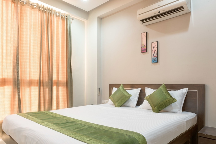 Imagen de la habitación del Hotel Treebo Shrimad Residency. Foto 12