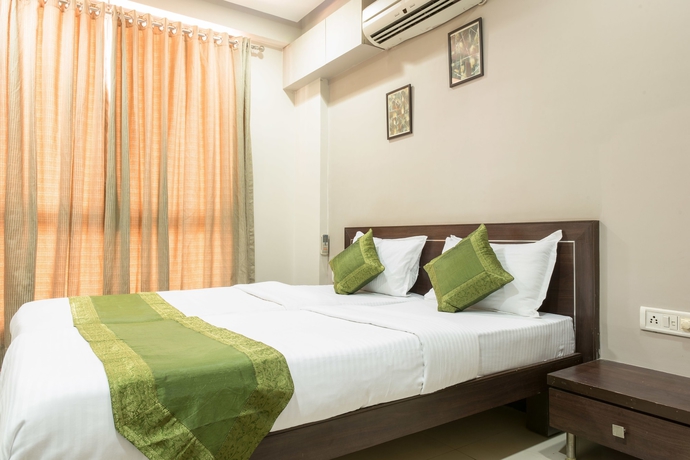Imagen de la habitación del Hotel Treebo Shrimad Residency. Foto 14