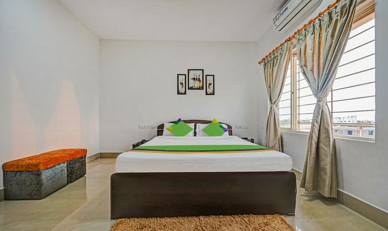 Imagen de la habitación del Hotel Treebo Sidhartha Inn Baliapanda. Foto 19