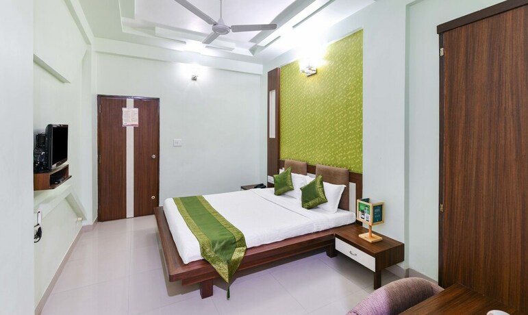 Imagen de la habitación del Hotel Treebo Skylon. Foto 16