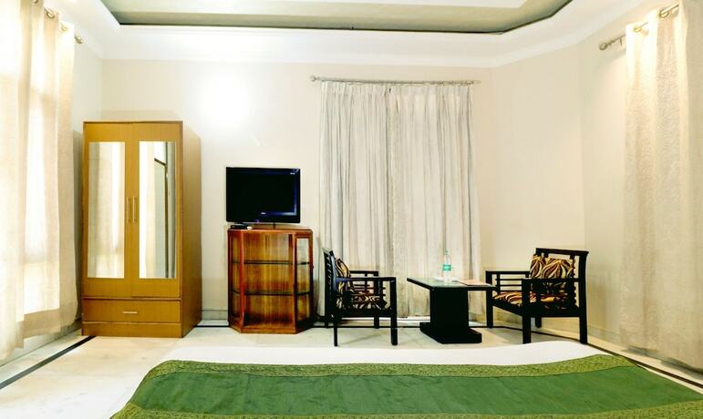 Imagen de la habitación del Hotel Treebo Star Guest House. Foto 16