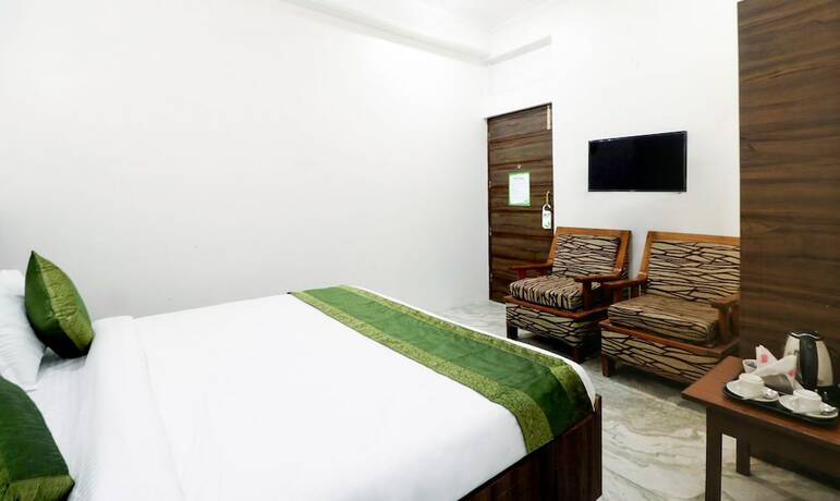 Imagen de la habitación del Hotel Treebo Star Guest House. Foto 17