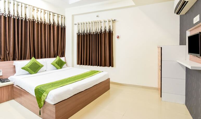 Imagen de la habitación del Hotel Treebo Sun Star. Foto 17