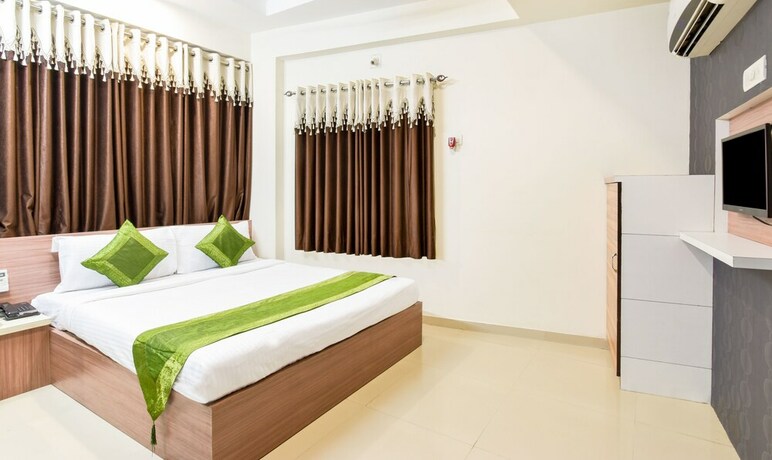 Imagen de la habitación del Hotel Treebo Sun Star. Foto 19