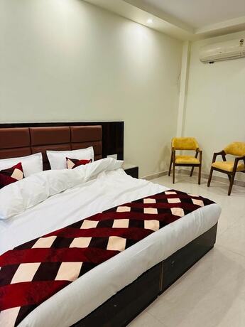 Imagen de la habitación del Hotel Treebo Sunny Feast. Foto 17