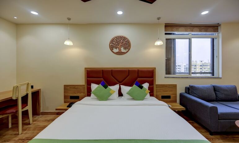 Imagen de la habitación del Hotel Treebo Trend Aasma Downtown. Foto 17
