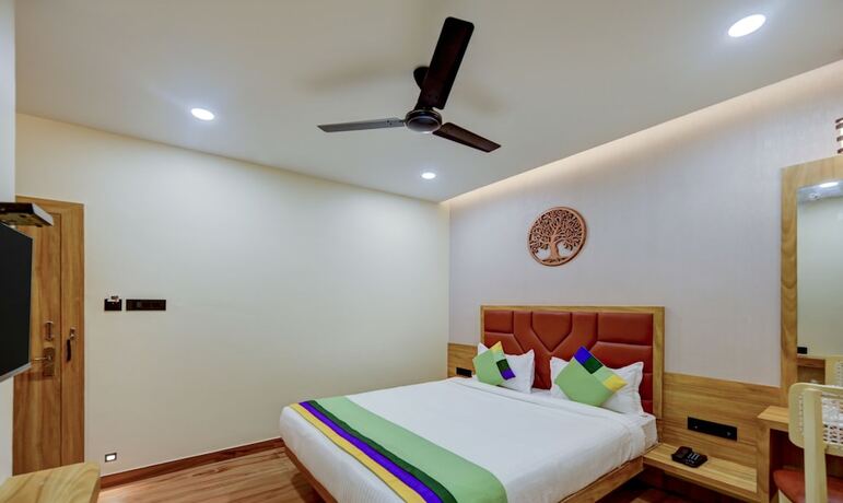 Imagen de la habitación del Hotel Treebo Trend Aasma Downtown. Foto 19