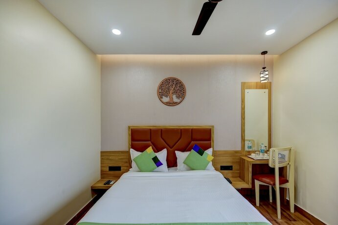 Imagen de la habitación del Hotel Treebo Trend Aasma Downtown. Foto 20