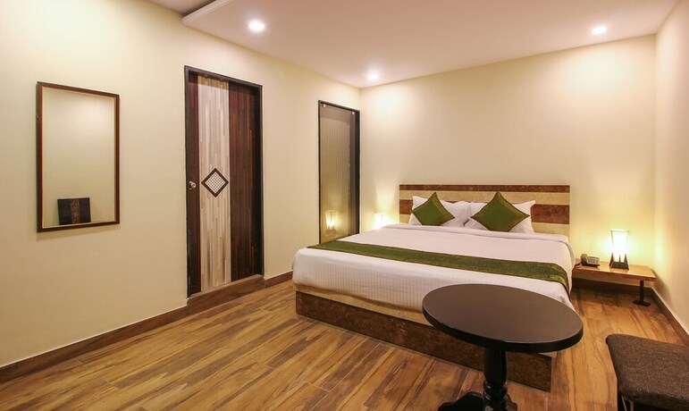 Imagen de la habitación del Hotel Treebo Trend Address Inn. Foto 24