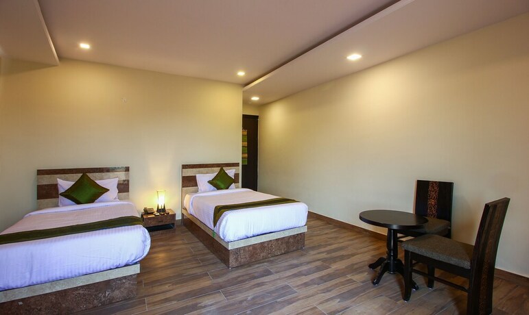 Imagen de la habitación del Hotel Treebo Trend Address Inn. Foto 27