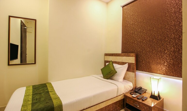 Imagen de la habitación del Hotel Treebo Trend Address Inn. Foto 30
