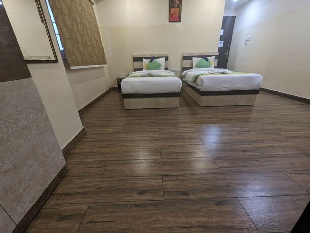 Imagen de la habitación del Hotel Treebo Trend Address Inn. Foto 32