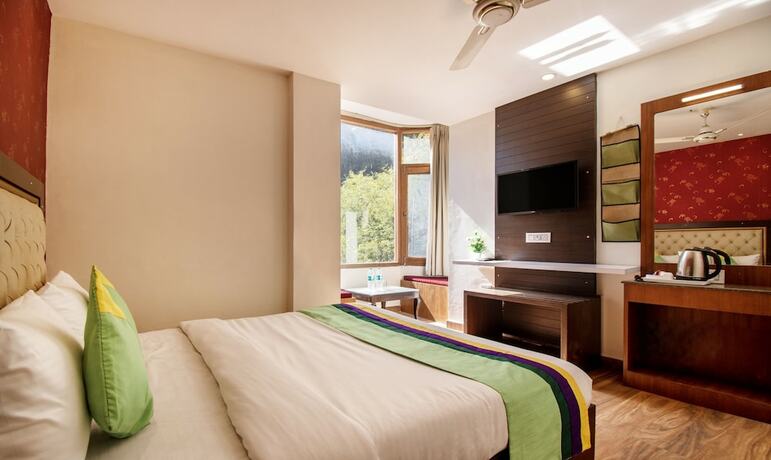 Imagen de la habitación del Hotel Treebo Trend Ambika Residency. Foto 17