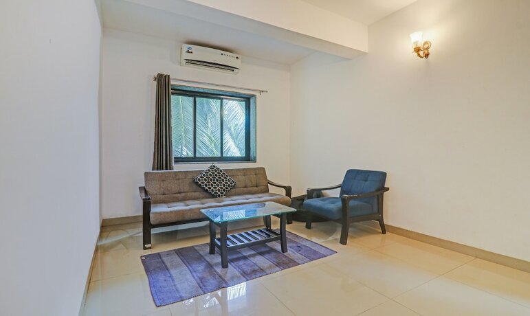 Imagen de la habitación del Hotel Treebo Trend Aquamarine Arpora. Foto 18